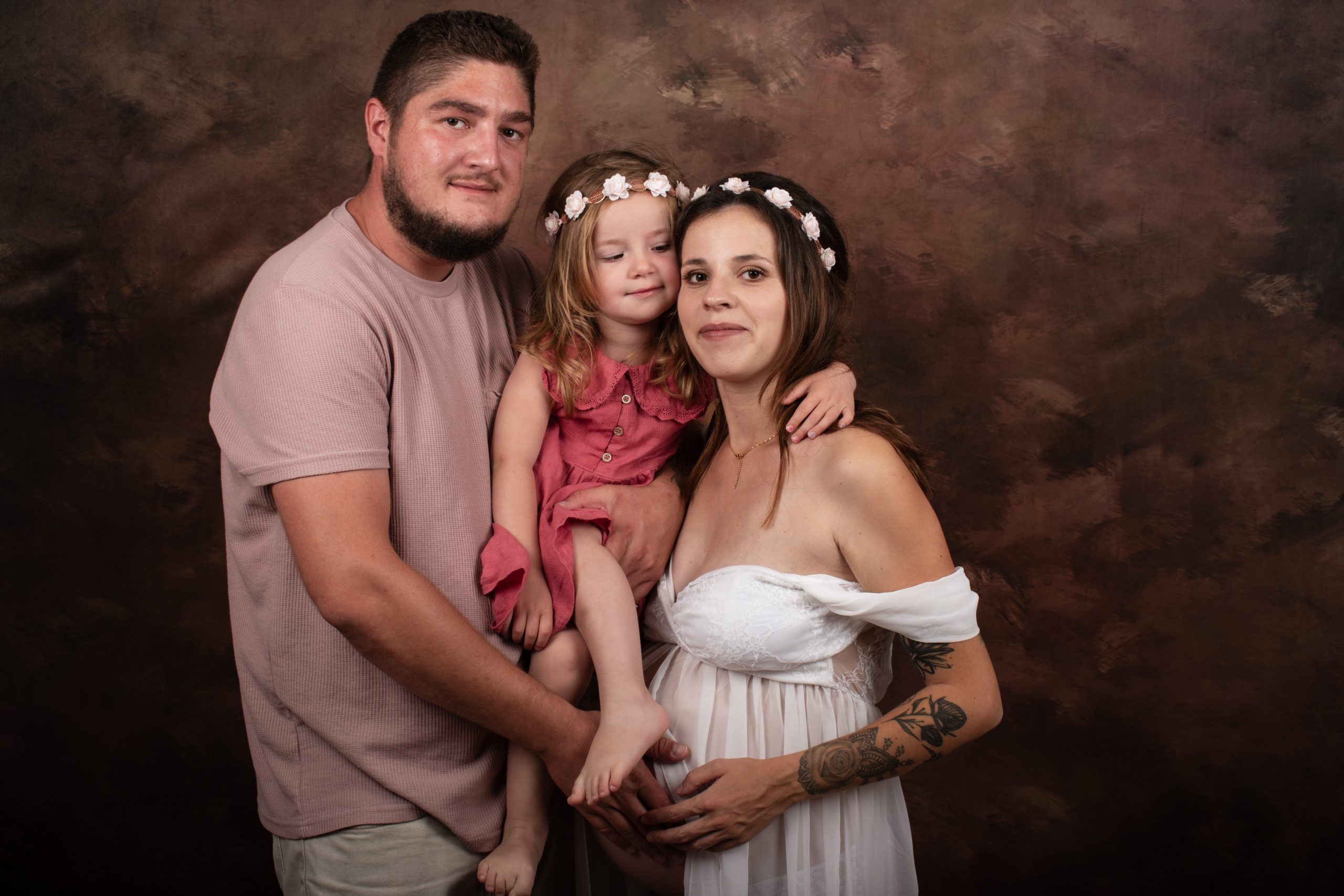 couple qui attend un bébé et leur fille